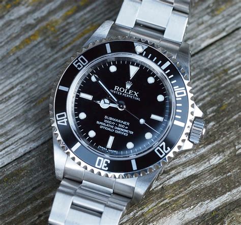 rolex submariner 14060m 2 lignes|Rolex Submariner 14060 stainless date.